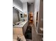 This bathroom features a dual sink vanity and a tub at 10207 Cody Ln, Orlando, FL 32825