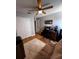 Bedroom with a fan, hardwood floors, closet, desk and chair at 10207 Cody Ln, Orlando, FL 32825