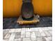 Backyard features a decorated fountain sitting on the brick paver patio at 10207 Cody Ln, Orlando, FL 32825