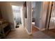 Hallway showing access to the bathroom and bedroom with hardwood flooring at 10207 Cody Ln, Orlando, FL 32825