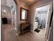 Hallway featuring hardwood flooring and leading to the bathroom at 10207 Cody Ln, Orlando, FL 32825