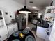 Charming kitchen featuring stainless steel appliances and a cozy breakfast nook at 10207 Cody Ln, Orlando, FL 32825