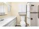 Cozy bathroom featuring a shower and vanity with ample storage at 1101 Oregon Ave, St Cloud, FL 34769