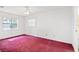 Large bedroom with large windows and a ceiling fan at 1101 Oregon Ave, St Cloud, FL 34769