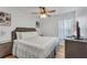Inviting bedroom with a queen-sized bed, modern furnishings, and neutral décor at 1129 Park Ridge Cir, Kissimmee, FL 34746