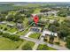 Aerial shot of a home showcasing the property layout and surrounding neighborhood at 1158 Stroupe Rd, Kissimmee, FL 34744