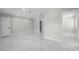 Spacious bedroom with marble floors and neutral paint, ready for personalization at 1158 Stroupe Rd, Kissimmee, FL 34744