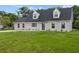 Charming single-Gathering home with fresh landscaping and inviting curb appeal at 1158 Stroupe Rd, Kissimmee, FL 34744