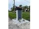 Mailbox with a modern design and the house number displayed prominently, surrounded by landscaping at 1158 Stroupe Rd, Kissimmee, FL 34744