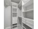 Spacious walk-in closet with built-in shelving and drawers, providing ample storage at 1158 Stroupe Rd, Kissimmee, FL 34744