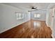 Inviting living room featuring light hardwood flooring, white walls, and bright natural light at 1211 Lehigh St, Kissimmee, FL 34744