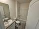 Clean bathroom offers a shower and tub combo with modern fixtures at 1370 Holodak Dr, Davenport, FL 33837