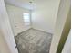 Cozy bedroom with carpet flooring and a window provides natural lighting at 1370 Holodak Dr, Davenport, FL 33837