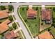 Areal view of home with manicured lawn at 1776 Bella Lago Dr, Clermont, FL 34711