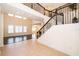 Inviting entryway with a view of the staircase and bright, open living spaces at 1776 Bella Lago Dr, Clermont, FL 34711