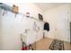 Convenient laundry room with sink, storage, and access to the outdoors at 1776 Bella Lago Dr, Clermont, FL 34711