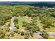 Gorgeous estate featuring a well-appointed home and a peaceful wooded backdrop at 1781 Terra Verde Ln, Chuluota, FL 32766