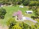 Elegant home with a long driveway and lush, green surroundings at 1781 Terra Verde Ln, Chuluota, FL 32766