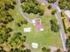 Expansive aerial view showcases the layout of this property and surrounding greenery at 1781 Terra Verde Ln, Chuluota, FL 32766