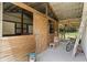 An interior view of a barn featuring wooden stalls and exposed beams at 1781 Terra Verde Ln, Chuluota, FL 32766