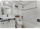 Stylish bathroom with a tub/shower combo, a modern vanity, and unique fixtures at 1781 Terra Verde Ln, Chuluota, FL 32766
