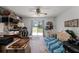 Cluttered room with a sliding glass door that allows access to the outside area at 1781 Terra Verde Ln, Chuluota, FL 32766