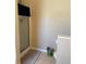 Bathroom featuring a shower, toilet, tile flooring, and neutral walls for a clean, functional space at 2106 Congress Ln, St Cloud, FL 34769