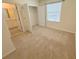 Bedroom featuring plush carpets, natural lighting, and closet space with views of the vanity at 2278 Tay Wes Dr, St Cloud, FL 34771