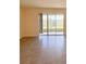 Bright living room with tiled flooring, recessed lighting and sliding door to the backyard at 2278 Tay Wes Dr, St Cloud, FL 34771