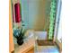 Cozy bathroom featuring a shower-tub combo, decorative towels and plants for a refreshing touch at 2281 Royal Ridge Dr, Davenport, FL 33896