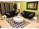 Chic living room featuring modern furniture, a stylish rug, and ample natural light at 2281 Royal Ridge Dr, Davenport, FL 33896