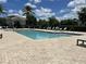 Large community pool with plenty of deck space and lounge chairs at 2436 Gratia Pl, Casselberry, FL 32707