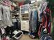 Walk-in closet with custom shelving and ample storage for clothes and accessories at 2436 Gratia Pl, Casselberry, FL 32707