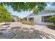 Private backyard oasis with a paver patio, mature landscaping, and serene ambiance for outdoor living at 2637 Debany Rd, Kissimmee, FL 34744