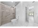 Bathroom featuring modern shower, commode and tile floors at 2637 Debany Rd, Kissimmee, FL 34744