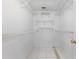A bright walk-in closet with multiple wire shelving units for storage at 2637 Debany Rd, Kissimmee, FL 34744