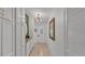 Bright entryway featuring tile floors, storage cabinets, and an eye-catching light fixture at 2727 Easton Ter, Lakeland, FL 33803
