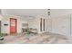 Large garage with an accent door and ample space for a seating area at 2727 Easton Ter, Lakeland, FL 33803
