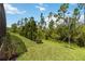 The home features a beautifully manicured lawn and landscaping at 2772 Southland St, St Cloud, FL 34772