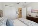 Cozy bedroom featuring natural light, closet space, and a well-decorated interior at 2772 Southland St, St Cloud, FL 34772