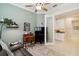 Well-appointed office area with a ceiling fan, and easy access to a kitchen at 2772 Southland St, St Cloud, FL 34772