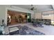 Inviting outdoor patio with comfortable seating, dining area, and seamless access to the home's interior at 2772 Southland St, St Cloud, FL 34772