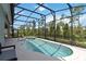 The home features a lovely screened pool with a connecting spa at 2772 Southland St, St Cloud, FL 34772