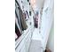 Spacious walk-in closet with custom shelving and storage at 2805 Carter Grove Ln, Kissimmee, FL 34741