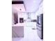 Modern kitchen with island and stainless steel refrigerator at 2805 Carter Grove Ln, Kissimmee, FL 34741
