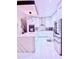 Modern kitchen with island and stainless steel refrigerator at 2805 Carter Grove Ln, Kissimmee, FL 34741