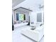 Modern living room with white tile floors, a large television, and contemporary decor at 2805 Carter Grove Ln, Kissimmee, FL 34741