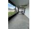 Relaxing screened patio with hammocks overlooking the serene backyard at 293 Fiddlewood Ct, Davenport, FL 33837