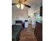 Cozy bedroom featuring modern flooring, a bed, TV, dresser, and a convenient kitchenette and bathroom at 3050 Old Soldier Rd, Lakeland, FL 33810