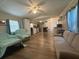 Open floor plan living room and dining area with plenty of light and ceiling fan at 3050 Old Soldier Rd, Lakeland, FL 33810